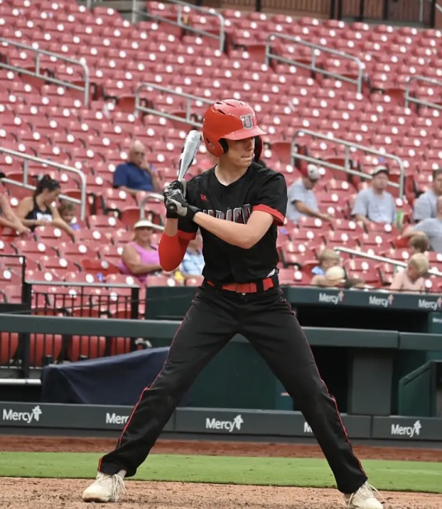 Union Knights baseball player prepares to bat during a game experience.