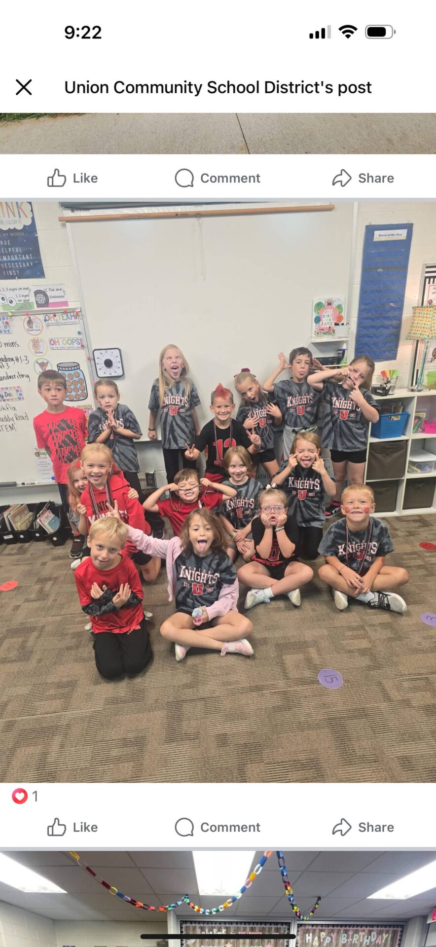 Elementary students in Union Knights shirts making silly faces in the classroom.